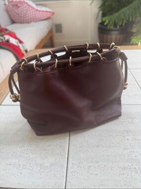 Women’s Brown Leather Handbag with Gold Ring Detail